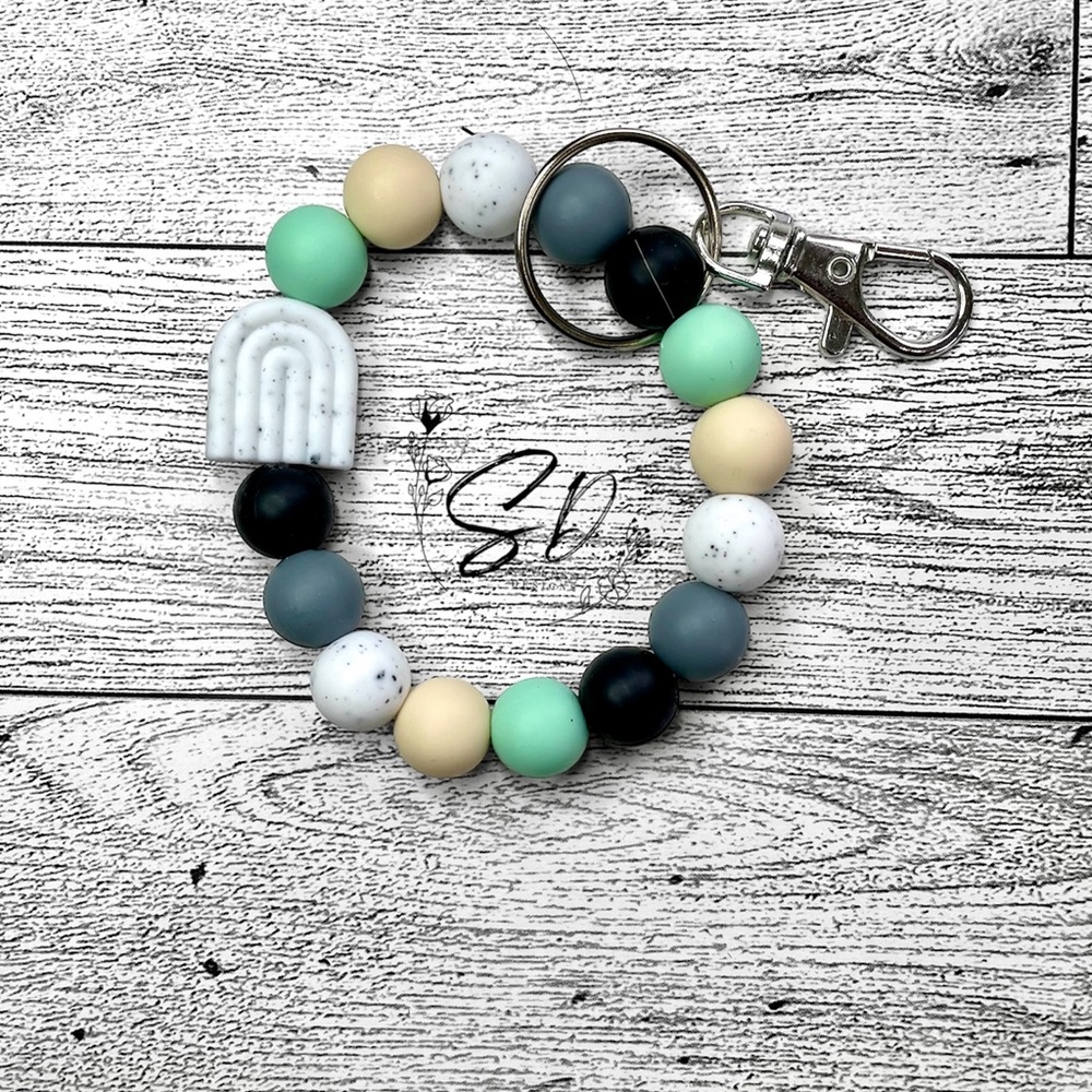 Small Silicone Wristlet With White Speckled Rainbow